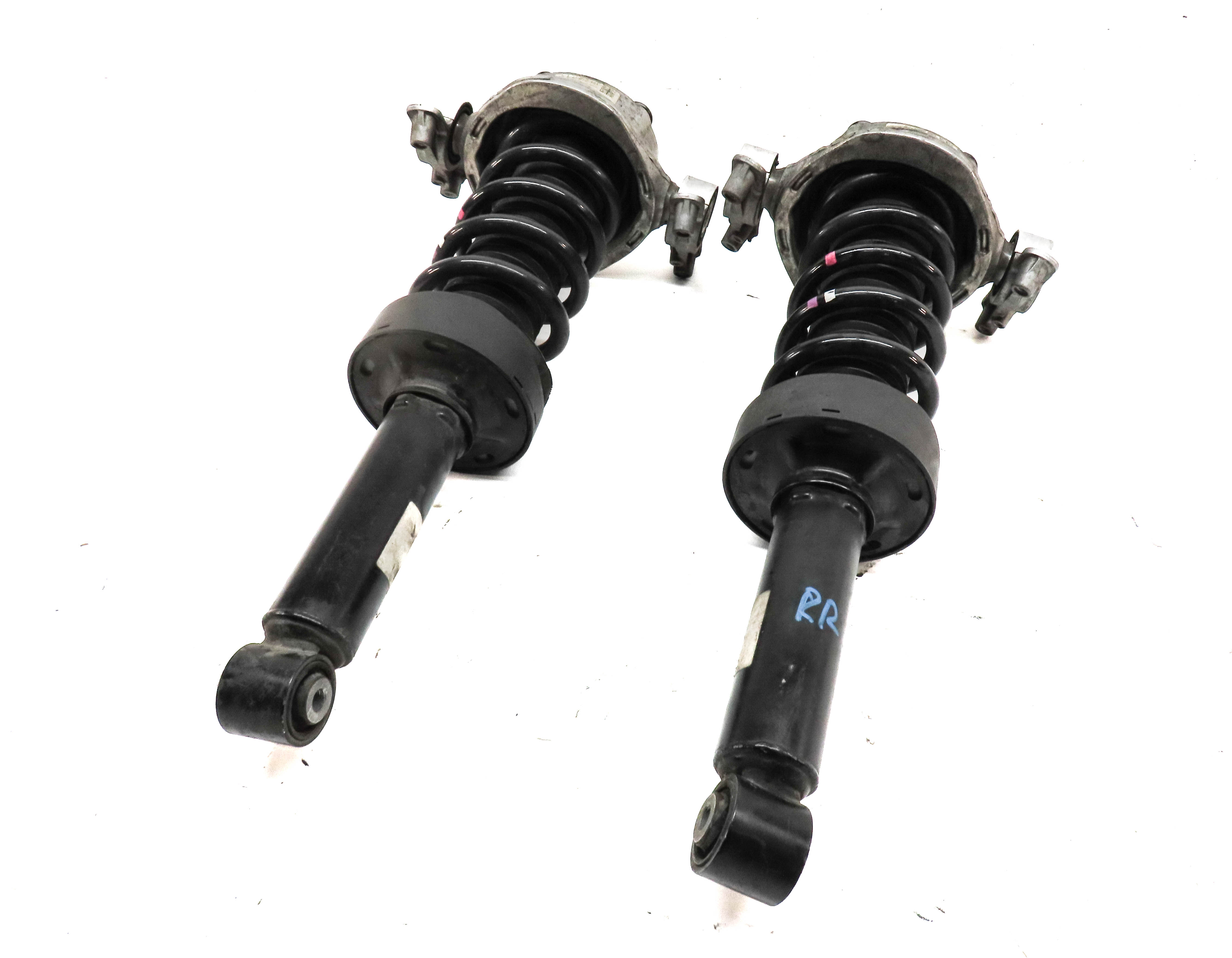 11-18 PORSCHE CAYENNE (958) REAR LEFT & RIGHT VDC VARIABLE DAMPING SHOCK STRUT — exact item pictured